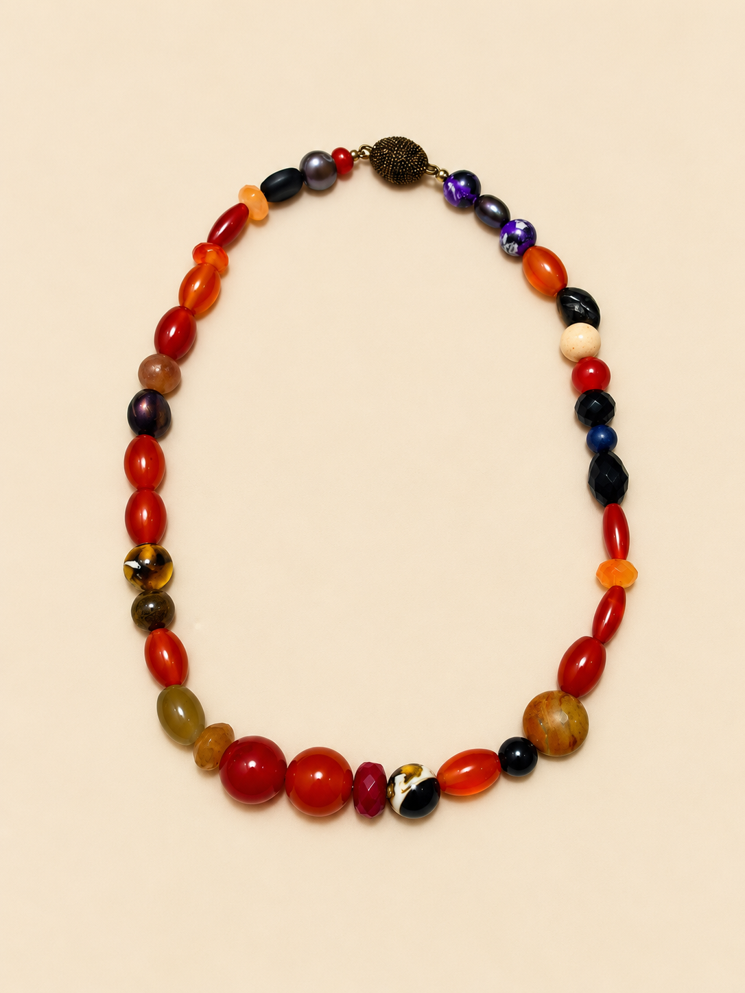 Multi-stone necklace laid flat, full length